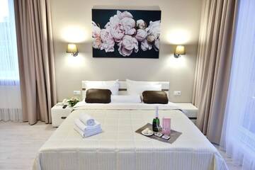Фото номера Люкс для новобрачных Отель Gosudar Hotel г. Кропивницкий 9