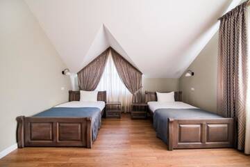 Фото номера Двухместный номер с 2 отдельными кроватями Отель Gosudar Hotel г. Кропивницкий 5