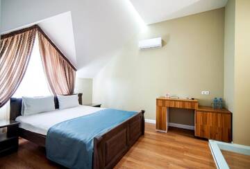Фото номера Номер Делюкс Отель Gosudar Hotel г. Кропивницкий 4