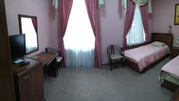 Фото номера Двухместный номер с 2 отдельными кроватями Отель Hotel Korona г. Кропивницкий 19