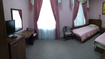 Фото номера Двухместный номер с 2 отдельными кроватями Отель Hotel Korona г. Кропивницкий 4